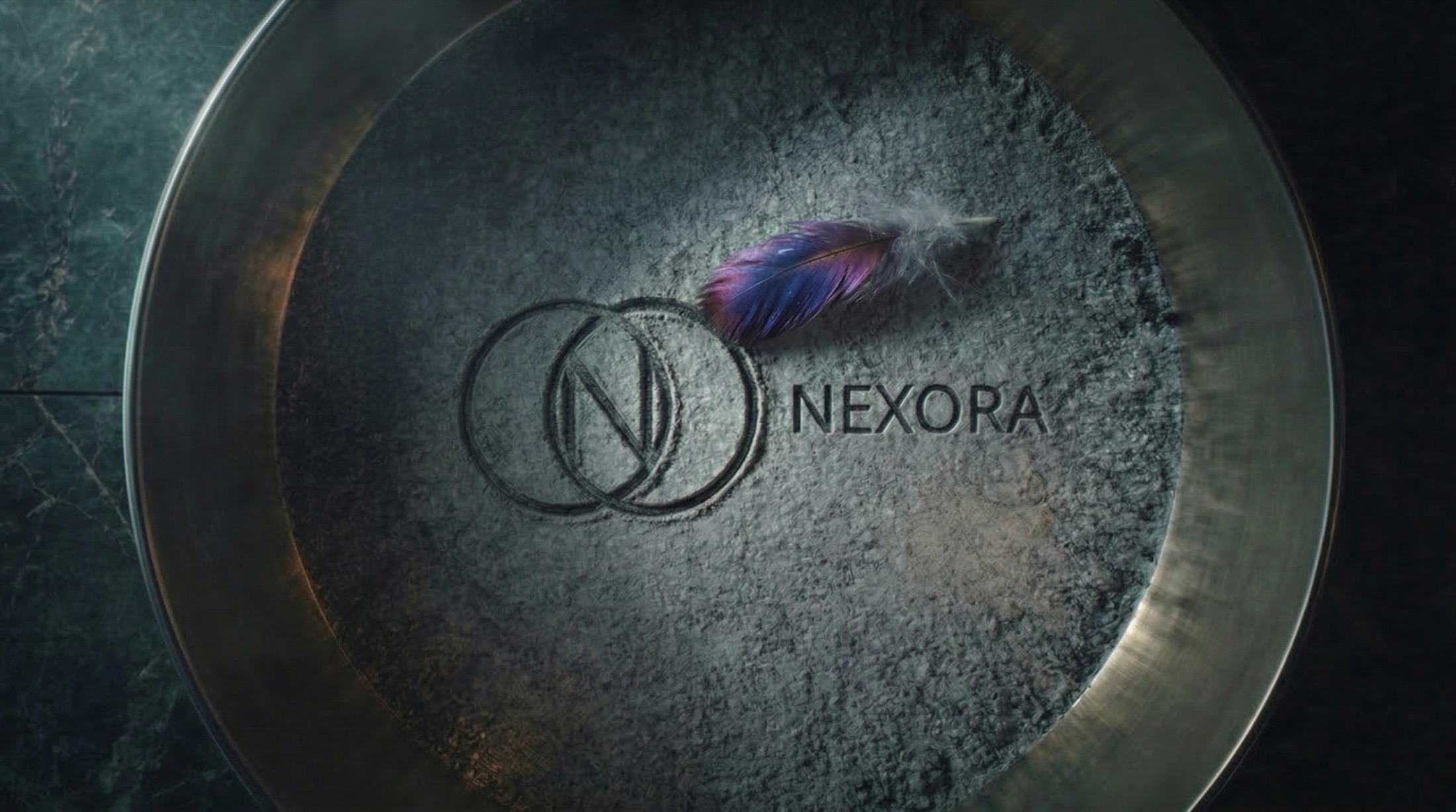 The Nexora sigil pressed into ash, beside a single phoenix feather